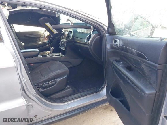 2018 Jeep Grand Cherokee Laredo E with VIN 1C4RJFAG8JC130465, listed as a IAAI auction lot 41789688 with 133,299 mi miles. Bid and sale history available at carsss.com. Image 5.