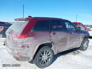 2019 Jeep Grand Cherokee Laredo E with VIN 1C4RJFAG1KC802450, listed as a IAAI auction lot 41617468 with 95,318 mi miles. Bid and sale history available at carsss.com. Image 4.