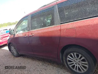 2015 Toyota Sienna XLE with VIN 5TDYK3DC3FS666438, listed as a IAAI auction lot 42117980 with 121,084 mi miles and . Bid and sale history available at DreamBid. Image 14.