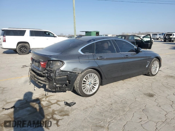 2015 BMW 4 Series 428i with VIN WBA4A9C52FD416219, listed as a Copart auction lot 48703365 with 87,162 mi miles and Clean title. Bid and sale history available at DreamBid. Image 3.