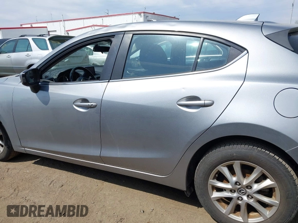 2014 Mazda 3 i Touring with VIN JM1BM1L70E1185972, listed as a IAAI auction lot 42005779 with 90,175 mi miles and . Bid and sale history available at DreamBid. Image 14.