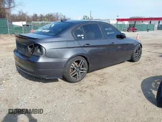 2007 BMW 3 Series 328xi with VIN WBAVC93587K031632, listed as a IAAI auction lot 41711350 with 184,703 mi miles. Bid and sale history available at carsss.com. Image 4.
