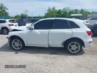 2014 Audi Q5 Premium Plus z VIN WA1CMAFP9EA041976, wystawiony jako IAAI lot #42296067 z przebiegiem 131 906 mil mil oraz . Historia ofert i sprzedaży dostępna na DreamBid. Obrazek 14.