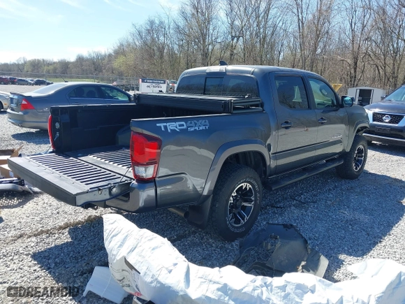 2019 Toyota Tacoma 4WD SR with VIN 3TMCZ5AN2KM268915, listed as a IAAI auction lot 41696555 with 33,573 mi miles. Bid and sale history available at carsss.com. Image 4.