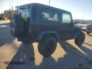 2010 Jeep Wrangler Rubicon with VIN 1J4BA6D10AL203265, listed as a Copart auction lot 79570754 with 114,840 mi miles and Salvage title. Bid and sale history available at DreamBid. Image 3.