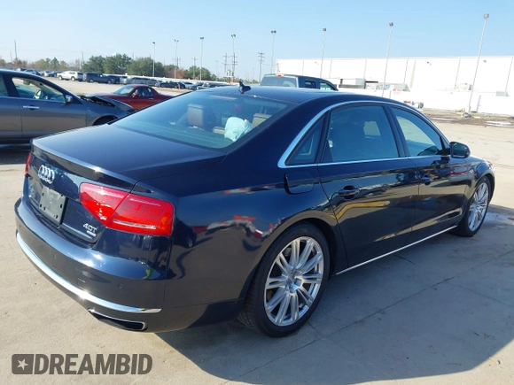 2013 Audi A8 L 4.0L with VIN WAUR2AFD3DN012893, listed as a IAAI auction lot 41209419 with 116,990 mi miles. Bid and sale history available at carsss.com. Image 4.