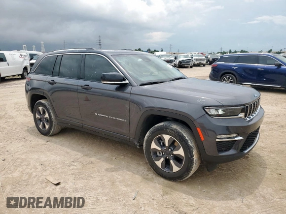 2022 Jeep Grand Cherokee with VIN 1C4RJYB68N8721311, listed as a Copart auction lot 59110545 with 27,922 mi miles and Clean title. Bid and sale history available at DreamBid. Image 4.