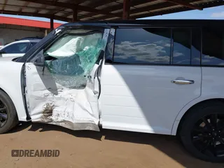 2019 Ford Flex SEL z VIN 2FMGK5C85KBA32026, wystawiony jako IAAI lot #41906819 z przebiegiem 75 295 mil mil oraz . Historia ofert i sprzedaży dostępna na DreamBid. Obrazek 14.