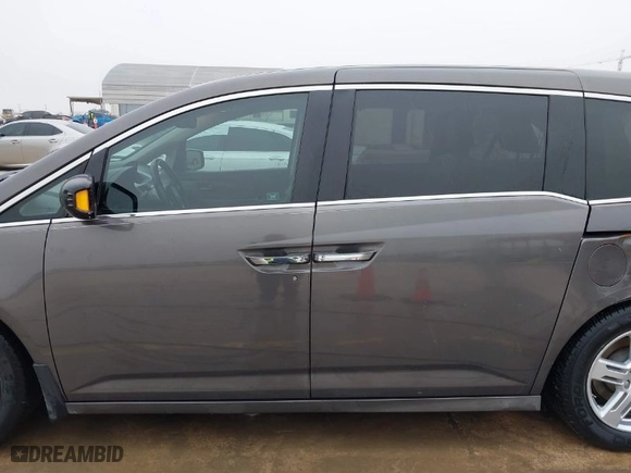 2012 Honda Odyssey Touring with VIN 5FNRL5H96CB084040, listed as a IAAI auction lot 41588818 with NaN miles. Bid and sale history available at carsss.com. Image 15.