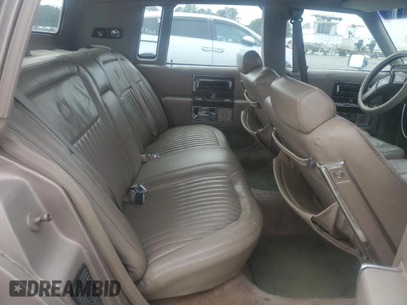 1990 Cadillac Brougham с VIN 1G6DW54Y1LR710024, выставлен на аукционе Copart как лот 88406975 с пробегом 183 170 миль миль и Чистый • Clean title. История ставок и продаж доступна на DreamBid. Изображение 10.