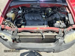 2002 Ford Escape XLT Choice with VIN 1FMYU03132KA78142, listed as a Copart auction lot 65527755 with 149,326 mi miles and Salvage title. Bid and sale history available at DreamBid. Image 11.