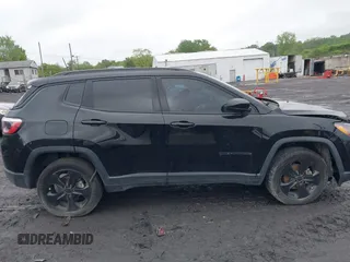 2021 Jeep Compass Latitude with VIN 3C4NJDBB6MT590092, listed as a IAAI auction lot 42351097 with 72,428 mi miles and . Bid and sale history available at DreamBid. Image 13.