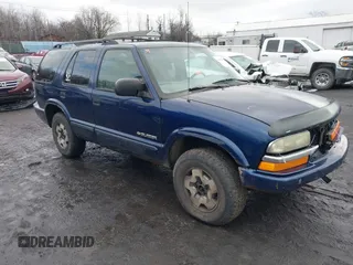 2004 Chevrolet Blazer LS z VIN 1GNDT13X54K156205, wystawiony jako IAAI lot #40983841 z przebiegiem 191 877 mil mil oraz . Historia ofert i sprzedaży dostępna na DreamBid. Obrazek 1.