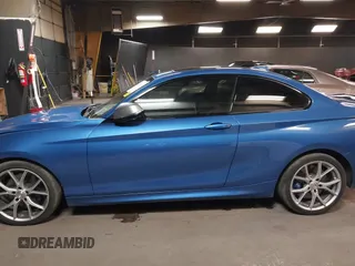 2016 BMW 2 Series M235i with VIN WBA1J7C58GV360712, listed as a IAAI auction lot 41975610 with 18,258 mi miles. Bid and sale history available at carsss.com. Image 14.