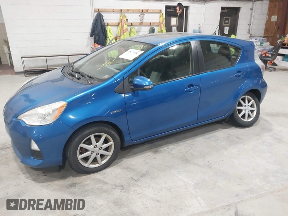 2012 Toyota Prius One with VIN JTDKDTB36C1003506, listed as a IAAI auction lot 42171285 with 144,240 mi miles. Bid and sale history available at carsss.com. Image 2.
