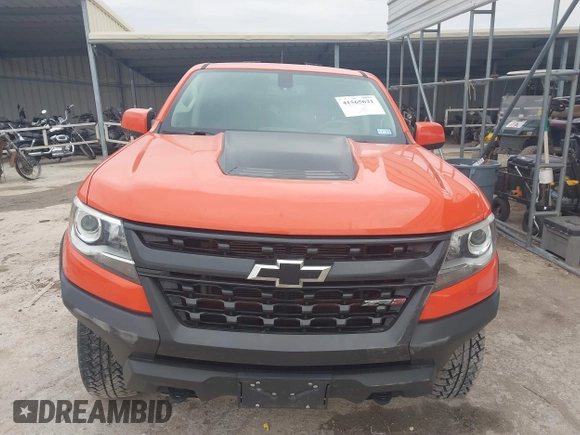 2019 Chevrolet Colorado 4WD ZR2 z VIN 1GCGTEEN9K1333740, wystawiony jako IAAI lot #41565621 z przebiegiem 71 484 mil mil oraz . Historia ofert i sprzedaży dostępna na DreamBid. Obrazek 12.