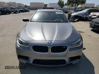 2014 BMW M5 z VIN WBSFV9C58ED593431, wystawiony jako Copart lot #54870555 z przebiegiem 172 191 mil mil oraz Szkoda całkowita • Salvage title. Historia ofert i sprzedaży dostępna na DreamBid. Obrazek 5.
