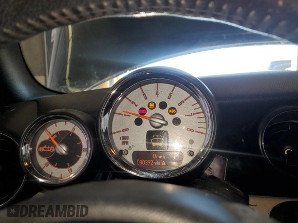 2012 MINI Convertible S with VIN WMWZP3C53CT250070, listed as a Copart auction lot 46649525 with 80,392 mi miles and Salvage Title. Bid and sale history available at DreamBid. Image 9.