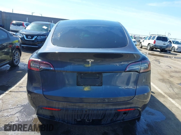 2020 Tesla Model Y Long Range with VIN 5YJYGDEF8LF000658, listed as a IAAI auction lot 41669246 with 44,281 mi miles and . Bid and sale history available at DreamBid. Image 17.