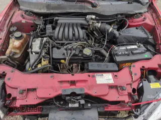 2001 Ford Taurus LX with VIN 1FAFP52UX1A176008, listed as a Copart auction lot 58983935 with 123,985 mi miles and Salvage title. Bid and sale history available at DreamBid. Image 11.