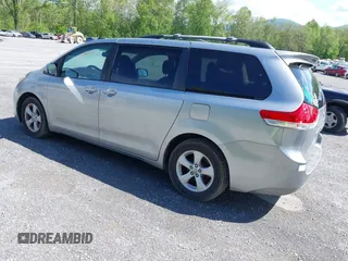 2011 Toyota Sienna LE AAS with VIN 5TDKK3DC2BS175598, listed as a IAAI auction lot 42186153 with 169,267 mi miles. Bid and sale history available at carsss.com. Image 3.