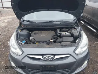 2012 Hyundai Accent SE with VIN KMHCU5AE9CU013458, listed as a IAAI auction lot 41475986 with 88,592 mi miles. Bid and sale history available at carsss.com. Image 10.
