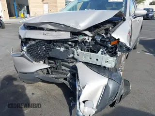 2024 Mazda CX-30 S Preferred with VIN 3MVDMBCM7RM638304, listed as a IAAI auction lot 41396590 with 15,702 mi miles and . Bid and sale history available at DreamBid. Image 6.