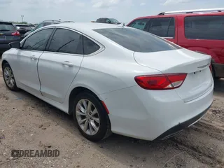 2015 Chrysler 200 C with VIN 1C3CCCCGXFN631935, listed as a IAAI auction lot 42144521 with 157,531 mi miles. Bid and sale history available at carsss.com. Image 3.