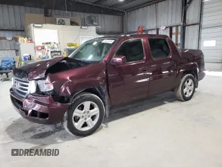 2013 Honda Ridgeline RTL with VIN 5FPYK1F59DB018582, listed as a Copart auction lot 61022245 with 126,892 mi miles and Salvage title. Bid and sale history available at DreamBid. Image 1.