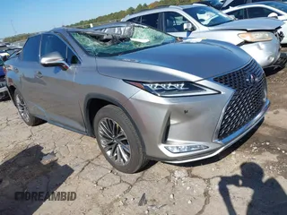 2020 Lexus RX with VIN JTJJGKFA7L2013877, listed as a IAAI auction lot 40678497 with 67,271 mi miles. Bid and sale history available at carsss.com. Image 1.