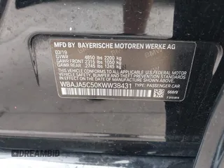2019 BMW 5 Series 530i with VIN WBAJA5C50KWW38431, listed as a IAAI auction lot 41483263 with 94,436 mi miles. Bid and sale history available at carsss.com. Image 9.