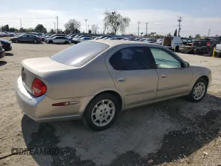 2000 Nissan Maxima GXE z VIN JN1CA31D0YT712485, wystawiony jako Copart lot #54956875 z przebiegiem 187 942 mil mil oraz Czysty tytuł • Clean title. Historia ofert i sprzedaży dostępna na DreamBid. Obrazek 3.