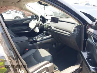 2021 Mazda CX-9 Touring with VIN JM3TCBCY8M0514905, listed as a IAAI auction lot 42385627 with 72,610 mi miles and . Bid and sale history available at DreamBid. Image 5.