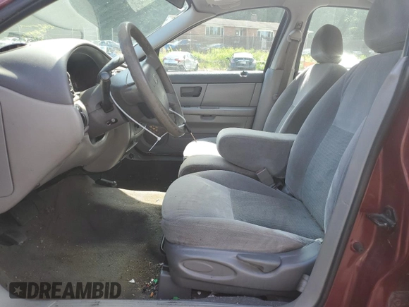 2005 Ford Taurus SE z VIN 1FAFP53U35A106807, wystawiony jako Copart lot #57023025 z przebiegiem 168 727 mil mil oraz Szkoda całkowita • Salvage title. Historia ofert i sprzedaży dostępna na DreamBid. Obrazek 7.