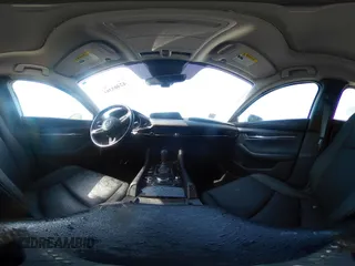 2022 Mazda 3 Carbon Edition with VIN 3MZBPACL0NM318573, listed as a IAAI auction lot 42403393 with 8,762 mi miles and . Bid and sale history available at DreamBid. Image 19.