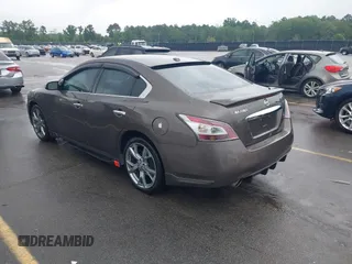 2014 Nissan Maxima S z VIN 1N4AA5AP2EC455230, wystawiony jako IAAI lot #42413381 z przebiegiem 182 766 mil mil oraz . Historia ofert i sprzedaży dostępna na DreamBid. Obrazek 3.