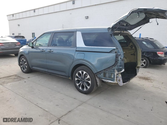 2023 Kia Carnival EX with VIN KNDNC5H32P6198936, listed as a Copart auction lot 84255854 with 35,364 mi miles and Salvage Title. Bid and sale history available at carsss.com. Image 2.