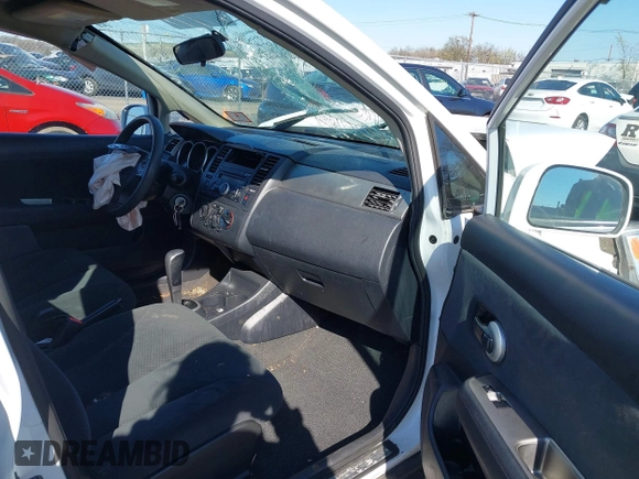 2011 Nissan Versa 1.8 S with VIN 3N1BC1AP5BL390720, listed as a IAAI auction lot 41962212 with 120,516 mi miles. Bid and sale history available at carsss.com. Image 5.