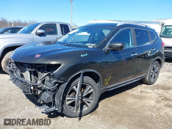 2017 Nissan Rogue SL with VIN JN8AT2MT8HW395084, listed as a IAAI auction lot 41858587 with 219,849 mi miles and . Bid and sale history available at DreamBid. Image 17.