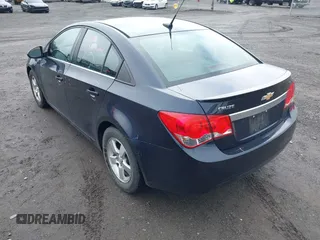 2013 Chevrolet Cruze 1LT with VIN 1G1PC5SB5D7312533, listed as a IAAI auction lot 41875213 with 94,953 mi miles and . Bid and sale history available at DreamBid. Image 3.
