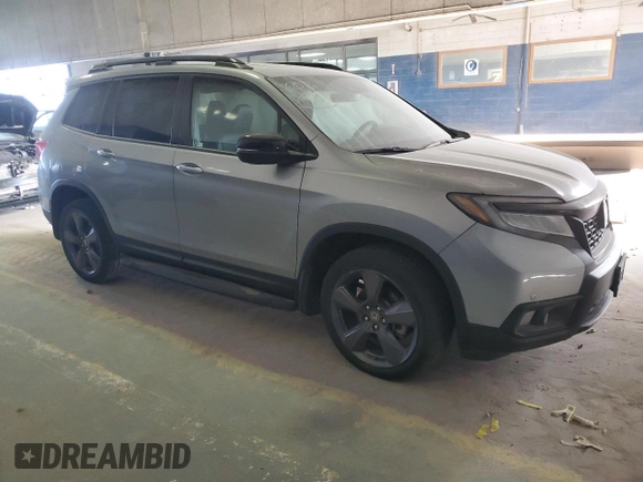 2021 Honda Passport Touring with VIN 5FNYF8H93MB010192, listed as a Copart auction lot 83013954 with Not Provided miles and Salvage Title. Bid and sale history available at carsss.com. Image 4.