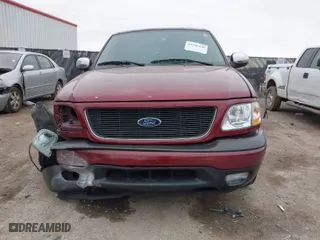 2004 Ford F-150 Heritage XL with VIN 2FTRF17204CA08424, listed as a IAAI auction lot 41588440 with 197,523 mi miles. Bid and sale history available at carsss.com. Image 12.
