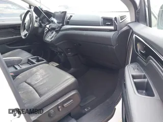 2023 Honda Odyssey Touring with VIN 5FNRL6H8XPB038875, listed as a IAAI auction lot 42441076 with 13,947 mi miles and . Bid and sale history available at DreamBid. Image 5.
