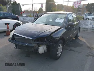 2001 Honda Civic LX with VIN 2HGES16501H619916, listed as a IAAI auction lot 41599951 with 230,395 mi miles. Bid and sale history available at carsss.com. Image 2.