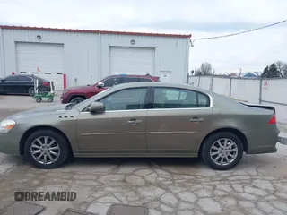 2011 Buick Lucerne CXL Premium with VIN 1G4HJ5EM0BU104715, listed as a IAAI auction lot 41706751 with 123,636 mi miles. Bid and sale history available at carsss.com. Image 14.