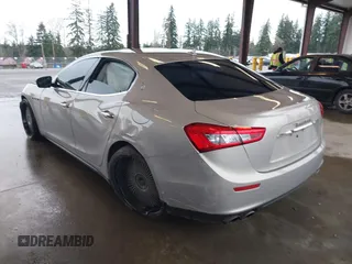 2017 Maserati Ghibli with VIN ZAM57XSLXH1238134, listed as a IAAI auction lot 41871754 with 34,776 mi miles. Bid and sale history available at carsss.com. Image 3.