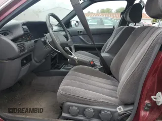 1991 Toyota Camry DLX z VIN 4T1SV21E0MU450578, wystawiony jako Copart lot #73990024 z przebiegiem 149 342 mil mil oraz Czysty tytuł • Clean title. Historia ofert i sprzedaży dostępna na DreamBid. Obrazek 7.