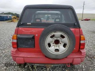 2002 Suzuki Grand Vitara z VIN 2S3TA52C926106795, wystawiony jako Copart lot #70664384 z przebiegiem Nie podano mil oraz Szkoda całkowita • Salvage title. Historia ofert i sprzedaży dostępna na DreamBid. Obrazek 6.