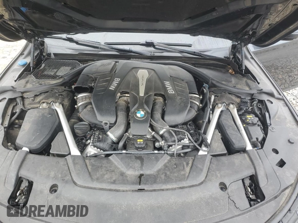 2019 BMW 7 Series 750i with VIN WBA7F0C54KGM25281, listed as a Copart auction lot 84741334 with 76,472 mi miles and Salvage Title. Bid and sale history available at carsss.com. Image 11.