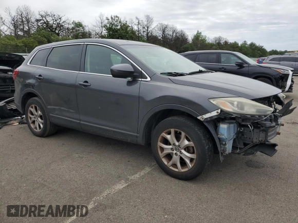 2014 Mazda CX-9 Touring with VIN JM3TB3CV1E0438847, listed as a Copart auction lot 62277205 with 209,050 mi miles and Salvage title. Bid and sale history available at DreamBid. Image 4.